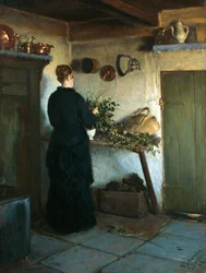 A esposa de artistas organizando flores